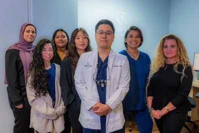 Group photo of Dr. Cho with New Life Dental staff